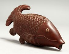 A JAPANESE CARVED WOOD CARP SNUFF BOX Signed.