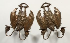 A GOOD PAIR OF BRONZE BAT SCONCES with double scrolling branches. 14ins