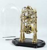 A 19TH CENTURY BRASS SKELETON CLOCK, with fusee movement, striking on a bell, under a glass dome