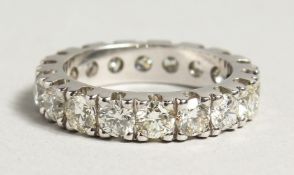 A GOOD 18CT WHITE GOLD DIAMOND SET ETERNITY RING