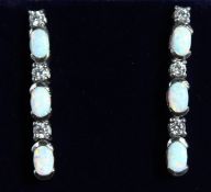 A PAIR OF SILVER AND GILSON OPAL LONG EARRINGS.