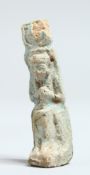 A SMALL EGYPTIAN USHABTI FAIENCE FIGURE 1.5ins high on a stand.