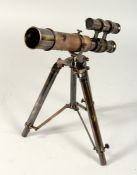 A SMALL TELESCOPE on a stand.