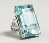 A SUPERB LARGE ART DECO AQUAMARINE 45ct AND DIAMOND SET RING, in 18ct white gold. By Edw. Reeves,