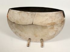 A SILVER-PLATED DECO VASE 12ins high.