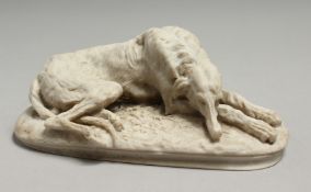 A LAVA STONE CARVED DOG. 5ins