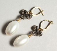 A PAIR OF PEARL AND ROSE DIAMOND BOW DROP EARRINGS