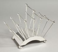A CHRISTOPHER DRESSER DESIGN SIX DIVISION SILVER-PLATED TOAST RACK