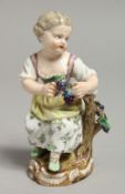 A 19TH CENTURY MEISSEN FIGURE OF A GIRL holding a bunch of grapes, seated on a tree stump.