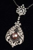 A GOOD 18CT WHITE GOLD DIAMOND AND PINK PEARL PENDANT.