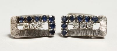 A PAIR OF 18CT WHITE GOLD SAPPHIRE AND DIAMOND CUFF LINKS