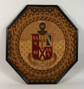 A GOOD 19TH CENTURY EMBROIDERED ARMORIAL, octagonal, framed. 31ins x 31ins.