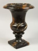 AFTER THE ANTIQUE A VEINED MARBLE URN 12ins high.