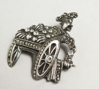 A MARCASITE FRUIT SELLER BROOCH
