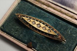 A VICTORIAN GOLD DIAMOND SET BROOCH.