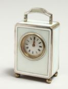 A VERY GOOD MINIATURE SILVER AND ENAMEL CLOCK on ball feet. 2.5ins high.
