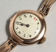 A LADIES’ VINTAGE GOLD ROLEX WRISTWATCH, the bracelet stamped 9ct CONNAUGHT.