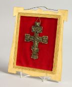 A RUSSIAN MOUNTED CROSS, FRAMED. 5ins x 3ins.