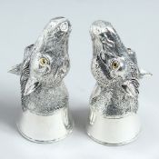 A PAIR OF .800 HORSES' HEADS SALT AND PEPPERS.