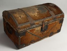 AN EARLY 19TH CENTURY MULE SKIN DOME TOP CHEST with carrying handles. 21ins long.