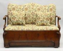 A LONG GEORGIAN MAHOGANY SETTEE with show wood arms and padded back and seat. 4ft 8ins long.