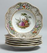 A SET OF SIX 19TH CENTURY DRESDEN PIERCED PLATES. Mark in blue.