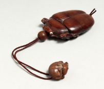 A LARGE JAPANESE CARVED WOOD BEETLE INRO AND ROPE 8cm Signed.