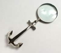 A MOULDED CHROME ANCHOR MAGNIFYING GLASS.