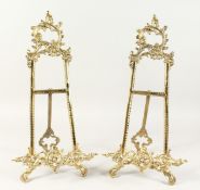 A PAIR OF BRASS PICTURE EASELS. 20ins high.