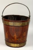 A 19TH CENTURY MAHOGANY AND BRASS BOUND BUCKET, with brass handle, the bucket inlaid with figures in