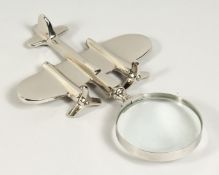 A MOULDED CHROME AEROPLANE MAGNIFYING GLASS.