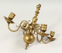 A SMALL 18TH CENTURY DUTCH BRASS FOUR BRANCH CHANDELIER. 1ft long.
