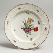 A GOOD LUDWIGSBERG PORCELAIN CIRCULAR PLATE with pierced border. Mark in blue, 9.25ins diameter.