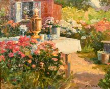 Yuri Kuchkin (b. 1942) Russian, 'A corner in a blooming garden', oil on board, signed, 24cm x