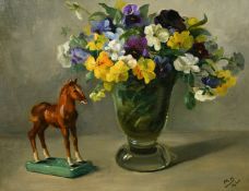 20th Century, A still life of flowers in a glass vase and a statue of a pony, oil on board,