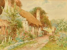 Josh Fisher (20th Century) British, A thatched cottage garden with flowers in bloom, watercolour,
