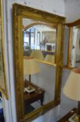 A good large modern decorative gilt framed mirror.