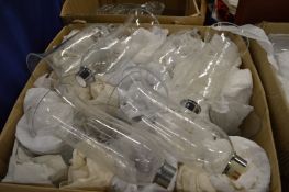 A quantity of etched lampshades.