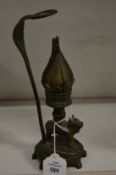 An unusual eastern brass lamp.