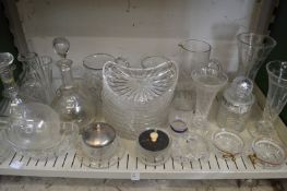 A shelf of glassware.
