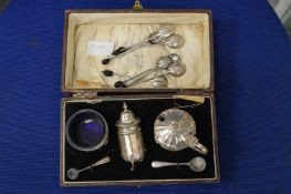A cased silver cruet set.