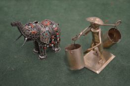 An Indian filigree elephant and another item.