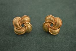 A pair of knot style earrings for pierced ears, stamped 18ct. 15 grams