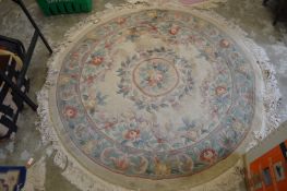 A Chinese circular rug.