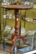 A 19th century mahogany circular tripod table.