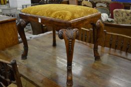 A good Georgian style carved walnut stool.