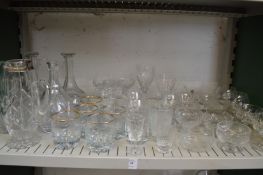 A shelf of glassware.