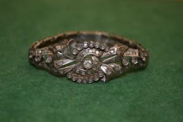 A diamond set bangle.