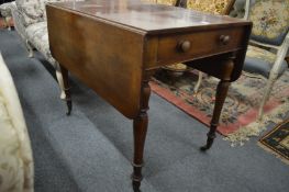 A mahogany Pembroke table.