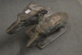 A double dog's head statue.